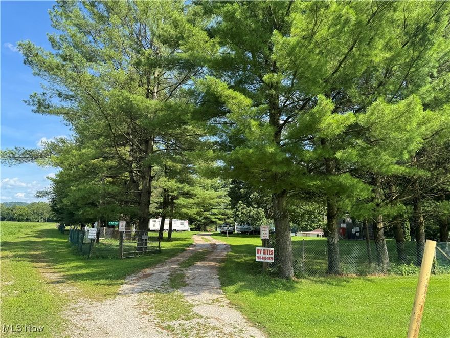 This campground is absolutely beautiful!  It is located in Sardis, OH, along the beautiful Ohio River, surrounded by trees, boat ramp, pavilion with picnic tables, dump station (multiple septic tanks), water, electricity, fenced in area with gate, security light, 10 campsites with hookups.  You are just minutes away from the post office, tire shop, dairy bar, restaurant, churches, and more!  This is in a highly sought after area, which should go fast!
