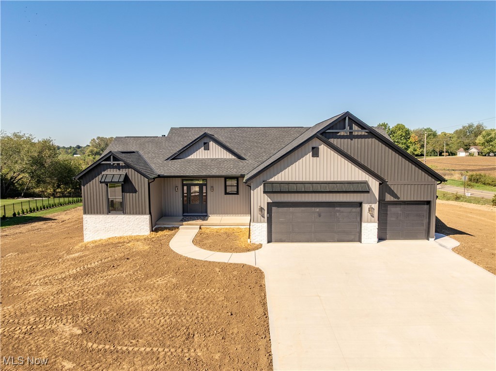Experience quality craftsmanship and thoughtful design in this beautiful new construction ranch by Hostetler Family Homes. With 2,781 total square feet, this custom-built home blends open, light-filled living with everyday convenience.
The inviting entry features a custom ceiling detail leading into the cathedral-ceiling great room and open kitchen with a spacious island and butler’s pantry with “Costco door” for easy grocery access. The split-bedroom layout offers a private primary suite with a walk-in closet connected to the laundry, plus two additional bedrooms and a full bath on the main level.
The finished walkout basement adds a large living area, full bath, and a flex room—perfect as a fourth bedroom, guest suite, or office. A three-car garage and thoughtful details throughout reflect the quality Hostetler Family Homes is known for.
Located in The Woodlands of Gentlebrook, a beautiful community of all new custom-built homes, this property offers the perfect blend of peaceful living and convenience—just minutes from Lake Local Schools, dining, shopping, and all that Hartville has to offer.