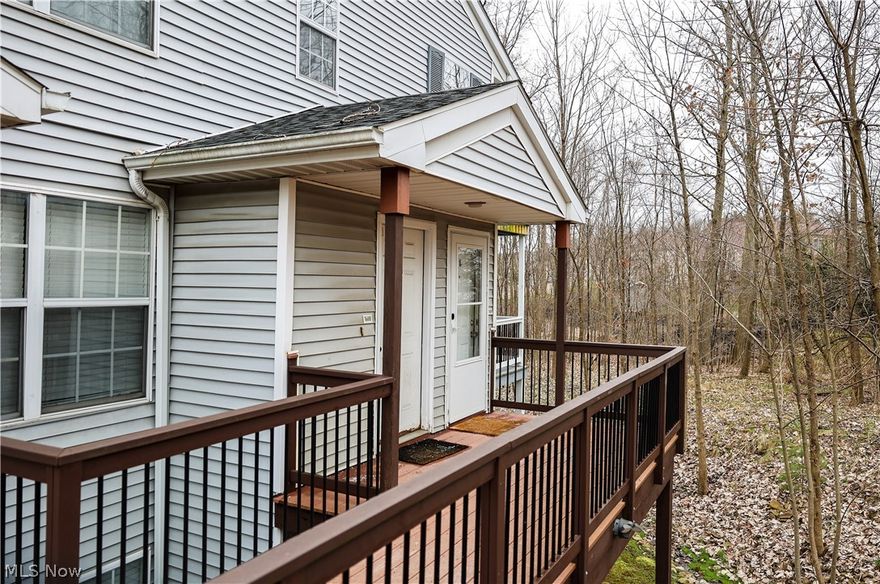 Move right in to this cozy, corner ranch! One of the more private units, it's easy to enjoy the beautiful wooded lot from your balcony!!  Great location, close to highways and shopping! This unit owns two garages, 19 + 20. The two garages would add $140/month to the HOA fee.  Current HOA is $303 plus 2 garages $140 ($70 each) for total HOA $443.  New owner has option to keep or sell garages if they wish.