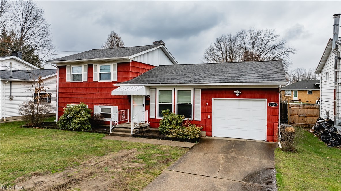 Introducing 3314 Broad Street, Parkersburg, West Virginia. A captivating split-level home featuring 3 bedrooms and 2 full bathrooms. Nestled in privacy, this residence boasts modern amenities and thoughtful details throughout. The main level welcomes you with a cozy living room with ample natural light. And an eat-in kitchen with a crisp clean look featuring white cabinets with black hardware, all white appliances and a black farmhouse style sink. The lower level has a generous sized family room has another full bathroom and is well-equipped with separate spacious laundry room and a large laundry sink for added convenience. Step outside to discover a covered rear porch, above ground pool and surrounded by wooden privacy fence. This home is designed for comfort, featuring central AC and gas heat to ensure a cozy environment year-round. The attached garage has plenty of work space and paved driveway provides ample off street parking. With public water and sewer services, this residence combines modern comfort with practicality. Also an added bonus that you’re not far from local amenities such as Grand Central mall, City Park, route 50. Don't miss the opportunity to call 3314 Broad Street home – a place where convenience, style, and privacy come together seamlessly. Set up your showing today!