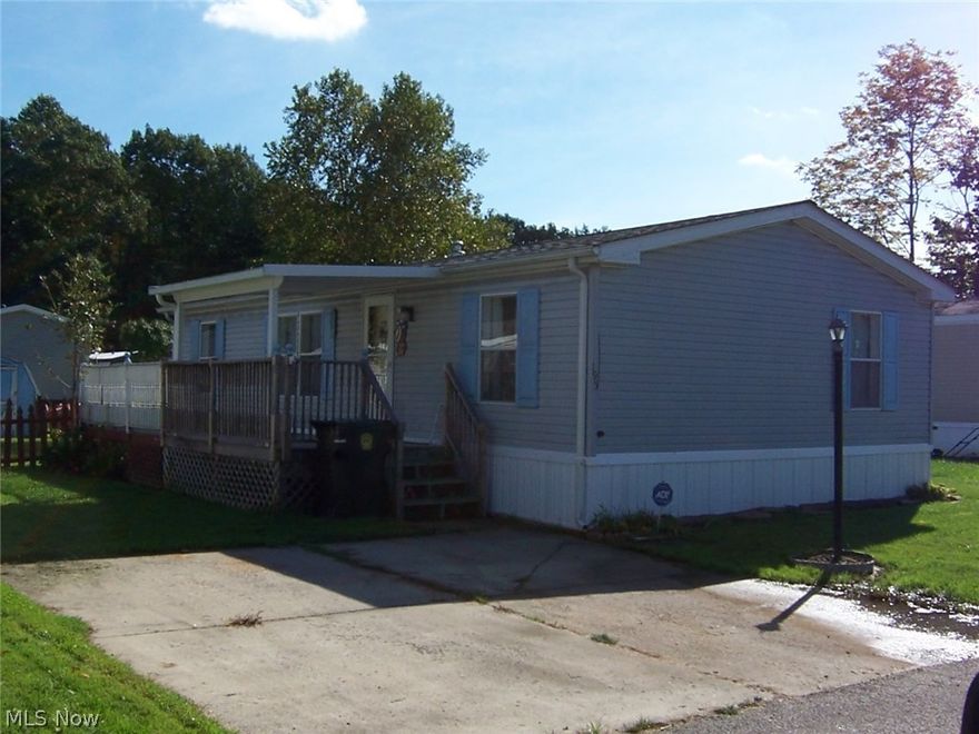 Located in Jefferson Mobile Estates. 3 bedroom 2 bath. Open plan with master bedroom and bath on east end, and the other 2 bedrooms and bath on west. Fenced yard, big 25'x8' deck and 12' of it is covered. Storage shed and paved drive.