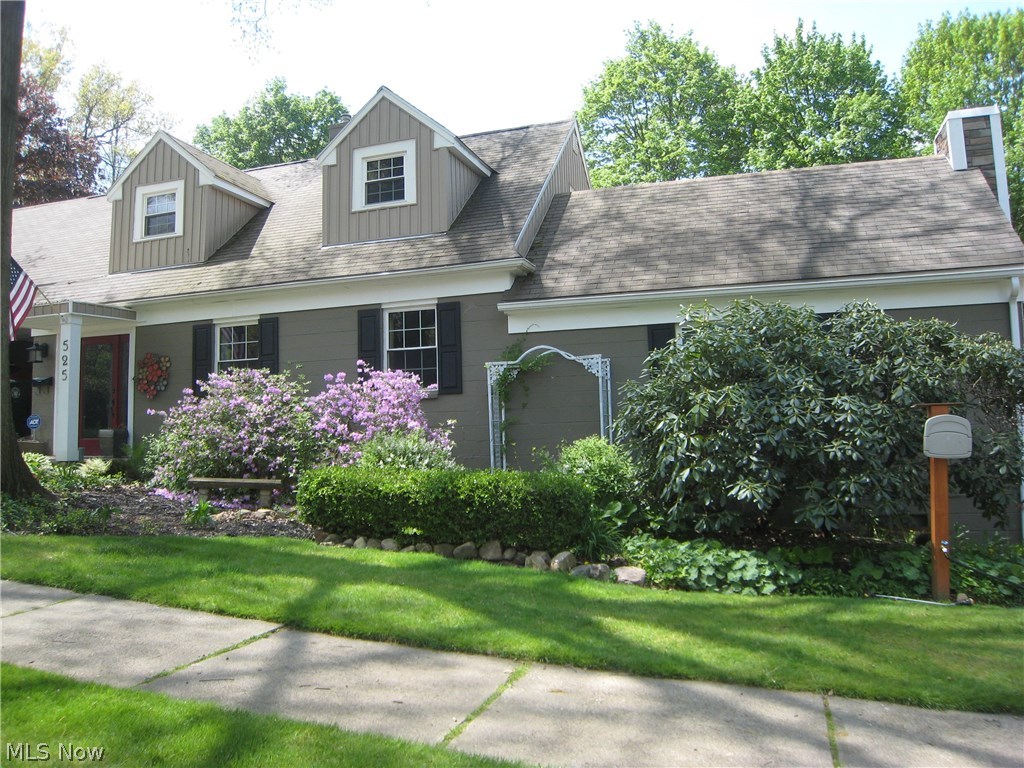 This home very unique and comfortable! There is a gourmet kitchen with appliances. There is also an eating area off of the kitchen with built ins. A huge formal dining room with sliders to the relaxing screened porch. You will love the dining room ceiling! A spacious sunken living room with a fireplace perfect for relaxing. There is a guest bedroom and half bath on the first level as well. Upstairs are two bedrooms and an updated full bath. 2 car attached garage. The hard wood floors in the home have all been redone. newer windows and roof. New central air in 2016. The basement has a work shop as well as a finished area with a fireplace. Lets not forget this beautiful yard. Many gardens with flowers and plantings. A fire pit and patio with built in seating. This house is perfect for entertaining indoors and out!