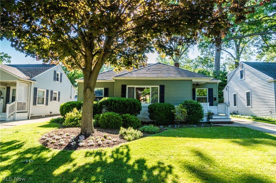 This beautiful Cape Cod has been completely re-imagined both inside and out. Fresh paint adorns the exterior, creating a charming cottage feel. Step inside and you'll be greeted by refinished hardwood flooring throughout the main living area, and open concept living! The kitchen offers brand new cabinets, appliances, flooring, lighting, tile backsplash and quartz countertops. The cozy bar seating opens to the living room and dining room, perfect for entertaining. Two nice sized bedrooms and a fully renovated bathroom with a gorgeous slipper tub and separate vanity sinks round out the first floor. Upstairs, you'll find the master suite you've been dreaming of, featuring new carpet and light fixtures! The upstairs bathroom has also been completely renovated and includes a subway tiled walk-in shower. Continue your entertaining outside in your backyard retreat, which includes a screened-in porch, wood privacy fence, and 2-car garage with concrete pad. All brand new! Other updates to the p