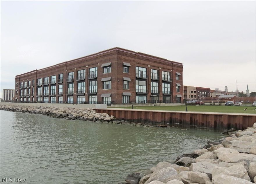 Lowest priced Chesapeake Lofts condo available! Buy in to the lifestyle. Fabulous views overlooking the pool, city marina and the coal docks. Great walk-ability to downtown amenities including exquisite restaurants, a taphouse, micro-brewery, theater and summer events. This is a very rapidly growing area! Association offers elevators to each floor, work-out room, pool and laundry. Secured building and gated community. Dockage available at city marina next door. Garages available separately for sale or rent from other owners. Don't wait on this one!