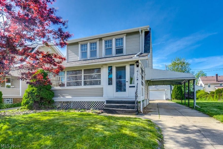 Welcome home to this charming colonial in desirable Firestone Park! Full of original century-home character, this property features beautiful unpainted woodwork, hardwood floors throughout, and a relaxing screened-and-windowed front porch perfect for enjoying multiple seasons.

The inviting first floor offers a cozy living room, spacious dining room ideal for entertaining, and a functional kitchen complete with refrigerator and gas range. Just off the kitchen, enjoy a partially fenced backyard with a freshly painted wood fence — great for pets, gardening, or outdoor gatherings.

Additional highlights include an oversized two-car garage in excellent condition, ideal for extra storage or a workshop, a concrete private driveway, and a convenient attached carport with side entry access to the kitchen and basement.

The finished basement provides versatile additional living space with finished walls, ceilings, and carpeted floors — currently used as a main living area and perfect for a rec room, home office, gym, or playroom. The basement also includes laundry hookups, a full bathroom with stand-up shower, storage closet, and sump pump.

Upstairs you’ll find three bedrooms and a full bathroom ready for your personal touches. The spacious primary bedroom comfortably fits a king-sized bed and includes an oversized closet. One bedroom also offers unique attic access through a stair-style closet.

Conveniently located just minutes from highway access, downtown Akron, Portage Lakes, shopping, and dining. This home offers a wonderful blend of historic charm, functional space, and practical updates in one of Akron’s most established neighborhoods.

Closing date is negotiable, though the sellers are ideally looking to move Mid-July.