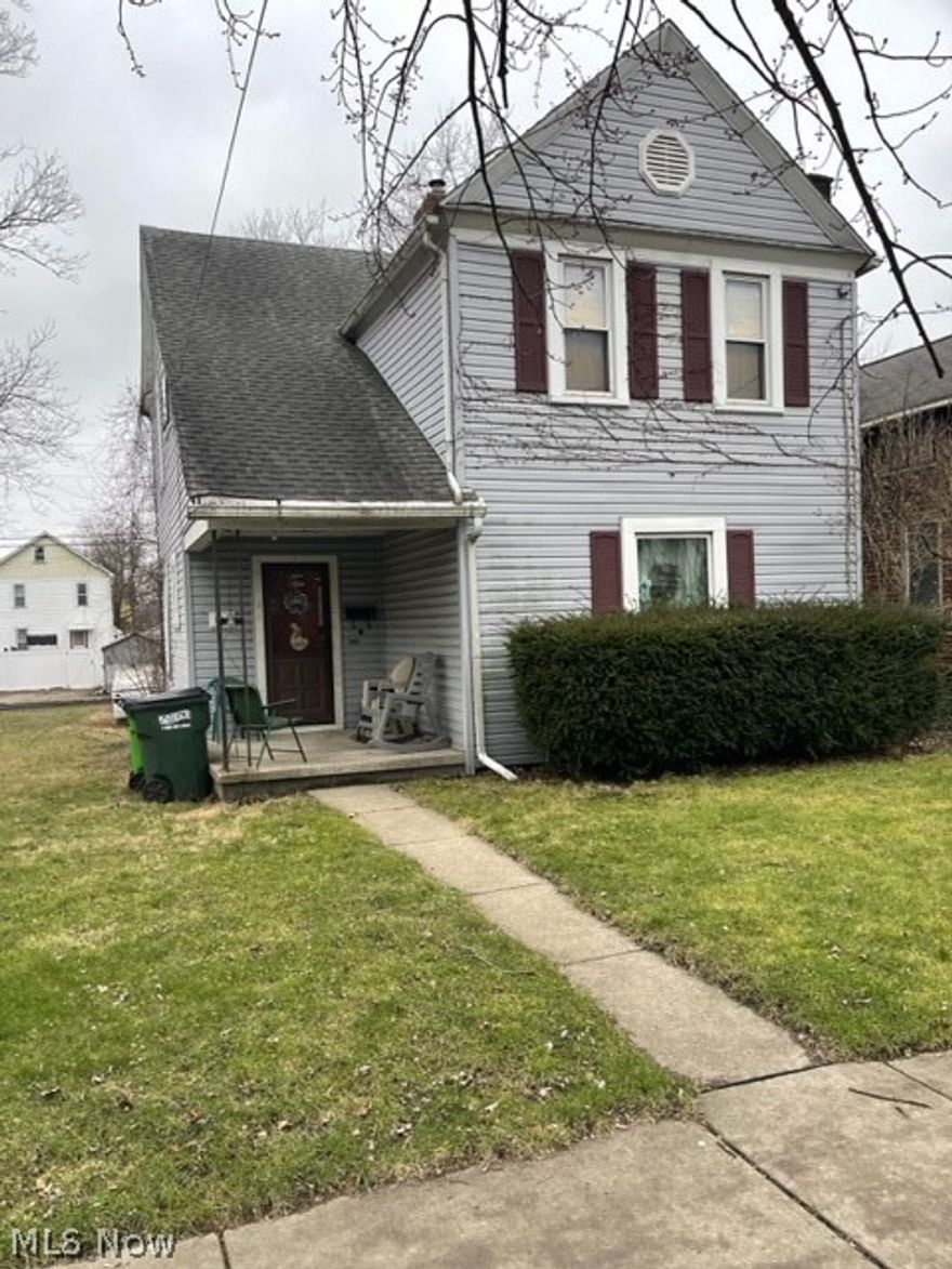 2 bedroom 1 bath colonial features updated windows and vinyl siding. Nice size rooms.  House is in need of repairs.  Hot water tank does not work. Lots of potential! Sold as-is to settle estates.  Seller will do no repairs.  CASH only.  Access to drive/garage is off alley.