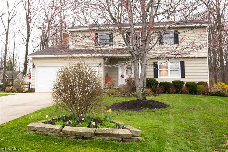 This four bedroom colonial on a quiet cul-de-sac street comes with 3 full and 1 half bath and is perfect for that family with growing children. The living and dining room are adjoining for additional family spae when needed. The kitchen is open and features laminate flooring with an attached dinette.  The dinette has a sliding glass door to one of two decks at the rear of the residence. Both rooms overlook a step down family room, complete with wood burning fireplace.  Upstairs there are 4 bedrooms; one bedroom has a separate door into the full bathroom. The master bedroom is complete with two separate closets and master bath with soaking tub and shower.  The lower level is finished with a den and wet bar.  Additionally, there is a completely separate full bath with jetted tub and separate shower.  There is also additional storage space.   The two car attached garage is equipped with a generator wired to the electrical panel in case of power failure. Newer furnace and air conditioning.