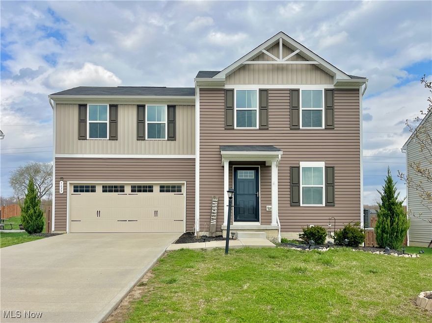 Welcome to 5639 Burlington Drive in Chippewa Lake! Thoughtfully maintained and truly move-in ready, this home offers modern finishes and a location that’s hard to beat. Step inside to an open and airy floor plan with vinyl plank flooring that flows through the spacious living room and into the eat-in kitchen. The kitchen features dark wood cabinetry, stainless steel appliances, and a large center island with a quartz countertop and breakfast bar—perfect for casual meals or entertaining. Sliding doors lead out to a gated wood deck, ideal for summer evenings or weekend get-togethers. The privacy-fenced yard expands your outdoor living and entertaining space. Upstairs, you'll find three generously sized bedrooms, including the owner’s suite with a private full bath. The bedrooms have upgraded carpet, not builder grade. The second-floor laundry room is conveniently located near the bedrooms and the washer & dryer are included. The unfinished basement has been rough plumbed for a future bathroom and offers excellent storage space. A 2-car attached garage adds convenience and functionality. Enjoy the neighborhood playground and walking path maintained by the HOA. Just minutes from your door, the legendary Chippewa Lake Amusement Park, a historic local landmark, is being thoughtfully reimagined by the Medina County Park District into a vibrant community destination. Set on the eastern shore of Ohio’s largest natural inland glacial lake, this 93-acre revitalization project will feature trails, future amenities, and recreational opportunities, including an accessible kayak launch. Public boating access is also nearby, making it easy to enjoy paddleboarding, kayaking, canoeing, jet skiing, pontoon cruising, fishing, and sailing. This is more than just a home… it’s a lifestyle.