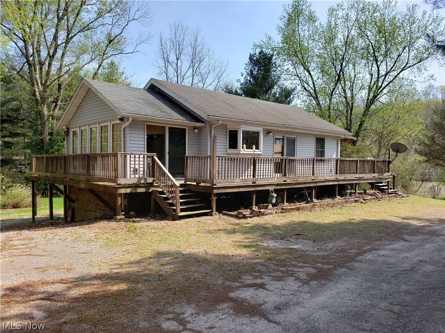This home is a perfect vacation getaway. It is situated on the Muskingum River. The home was updated in 2001 and features a wrap around deck with 2 porches, 4 sliding glass doors, a spectacular pine room with windows. It needs just a little TLC. This home is being sold "As-Is" where as is with all its faults. This property has been placed in an upcoming event. All offers should be submitted on Xome. All offers must be submitted with a pre-approval letter or a proof of funds letter. All offers received prior to the event period should be submitted by the buyer or buyer's agent by clicking on the “Make Offer” button on the Property Details page on Xome. All offers will be reviewed & responded to within 3 business days. All properties are subject to a  buyer’s premium pursuant to the Event Agreement & Terms & Conditions (minimums will apply). Auction dates 04/27/2019-04/30/2019