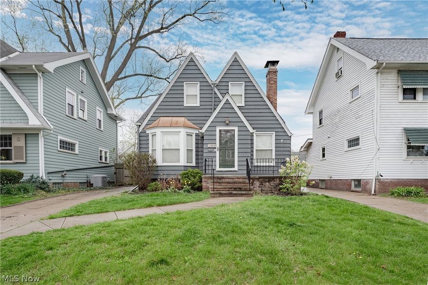 A Charming Cape Cod in the heart of sought-after Lakewood, offering classic character and a functional layout. Hardwood flooring runs throughout the first and second floors, adding warmth and continuity.

The front door opens into a spacious living room with a cozy fireplace, creating an inviting space for everyday living. The living room flows into the formal dining room, which features a bay window that brings in natural light and adds charm.

The kitchen includes tile flooring, ample cabinet space, and a full appliance package, providing a practical workspace. At the back of the home, a large family room offers flexible living space and potential for use as an additional bedroom.

A full bathroom completes the first floor. Upstairs, there are two bedrooms, including a primary bedroom with a large walk-in closet.

The finished basement adds living space with a recreation room, a second full bathroom, and a laundry and utility area.

Outside, a large back deck provides a great space for relaxing or entertaining. This home offers comfortable living in a desirable Lakewood location.