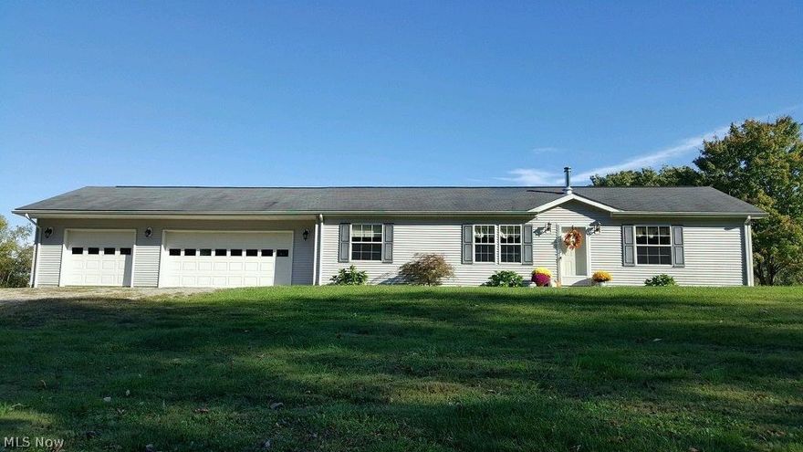 11.5 acres of privacy! 2003 manufactured home taxed as real estate with a 3-car attached garage. The home is beautifully decorated. There is an oak kitchen with an eating area, sliding glass doors to the trek deck overlooking the back wooded acres. Walk-in closets in every bedroom. Wood burning stove in living room. The home has lots of natural sunlight. There is a whole-house generator that is also connected to the 24X36 horse barn which has electric and water and a fenced-in pasture area. Lots of wildlife around making it good hunting ground. Sale is subject to sellers finding property of their choice.