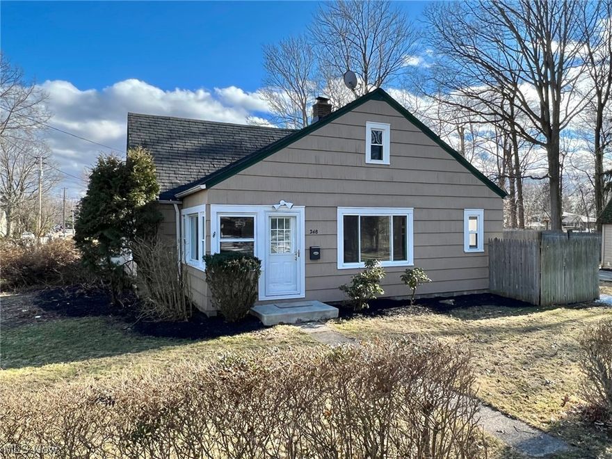 GREAT STARTER HOME....Move right into this Beautifully Updated 3 Bedroom & 2 Full Bath Bungalow! This charming home includes approx 1300 sqft of living space with freshly painted interior. Foyer entrance welcomes you with vinyl plank flooring and open to large Living Room/Dining Room combination with new carpeting & brick wood burning fireplace. Kitchen includes stainless steel stove, dishwasher & microwave. 2 Bedrooms on the first floor have new carpeting & ceiling fans. Second floor includes spacious Master Bedroom with full updated bath plus bonus area...ideal for nursery, home office or exercise area. 1st floor laundry room. Updated electrical panel, newer HWT & furnace. Central air. Vinyl windows. Fenced-in yard. Close to Lake Erie/Marina, parks, library and just minutes to shopping, restaurants and freeway access! Immediate Occupancy!