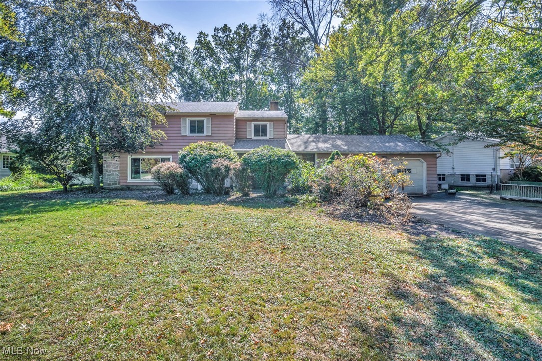 A beautiful gem with classic charm. Step inside to an open, sun filled living area with gleaming hardwood floors ready for your personal touch. The spacious features are perfect for everyday living. Located on a quiet street near parks, shopping and quick access to the highway. This move in ready home offers comfort, style and a prime location!