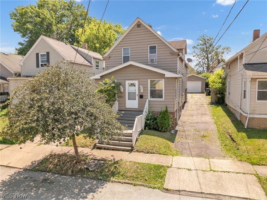 Welcome to this beautiful Old Brooklyn home. At the front of the home is a cozy, enclosed porch that leads into the living and dining room, both featuring hardwood floors, two walk-in closets and a half bath. The eat-in kitchen has a stove and refrigerator that are only 5 yrs old. This oversized kitchen also features a dishwasher, ceramic floors, subway tiled back splash, ample cabinet space and counterspace.  Both the full bath and 1/2 bath were updated in 2018. In 2014 this home was updated with a new furnace, A/C, hot water tank, electrical, plumbing and hardwired smoke and CO2 detectors. In the basement there is space to make it another finished living area, or just use it for storage and laundry. The back yard has privacy fencing on all four sides with a one-car garage built in 2013 with remote door opener.