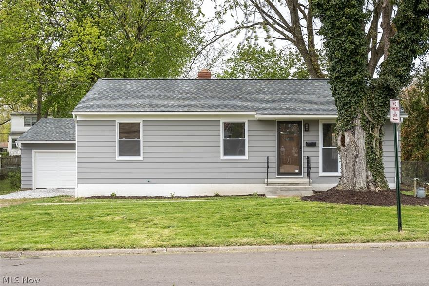 The Castle Park area is no doubt one of the most coveted in Akron. And this spot is primed and ready for its new owners. For those of you itching for an updated and move in ready home, well, here you go. All the hard stuff has been taken care of - roof, furnace, and a/c are all brand new. The main floor bathroom has been completely remodeled with gorgeous oversized subway tile. There has even been a brand new second bathroom added in the lower level where one never existed. Check the kitchen off your list as well. Walls were taken down and new cabinets installed, and appliances too. Open concept, you betcha. The downstairs lower level has been waterproofed and completely finished, adding additional living space. You can have that man cave, kids room, whatever you need it to be. The backyard is absolutely gigantic and, as such, can easily accommodate whatever pool/patio combo you dream up. Ranches like this don't come along very often. Better get to it sooner than later.