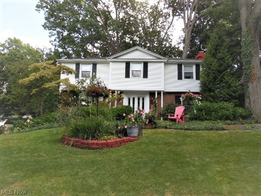 You'll be sold the instant you step foot into this beautiful well maintained home. The entry hall greets family and guests with a warm friendly feeling. The beautiful hardwood floors and gas log fireplace in the living room help to show your furnishings to their best advantage. Enjoy your fully Applianced step saving kitchen with granite counter tops and a nice sized pantry. The bright and cheery family room offers French doors that lead out to a gorgeous 4 season room and private setting. A master bedroom has space and grace galore and offers a private bathroom and walk in closet / dressing room. We are sure you will be pleased with the size of the bedrooms and closet space. The beautifully shrubbed and landscaped grounds provide privacy while enjoying time on your private patio or in the hot tub / fitness room. Hardwood floors under carpet in bedrooms and hall way as well as staircase. appliances are a gift to the buyer and are not warranted. TV wall unit in family room does not stay