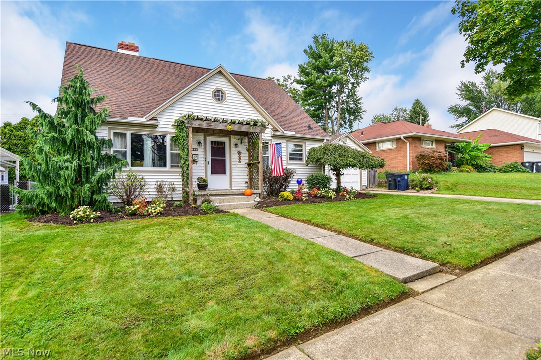 Adorable, larger than your average cape cod in Firestone Park. Large living room with fireplace open to the fully applianced kitchen. First floor has hardwood and tile. Two large bedrooms on the first for with a full bath. Large cottage style bedroom on the 2nd floor. Feels like your in a lodge! Large clean basement with 2nd full bath. Garage is attached through a breezeway. Backyard is private with a pond. Very clean! We are ready for a contract! Call your agent today FOR A PRIVATE SHOWING!