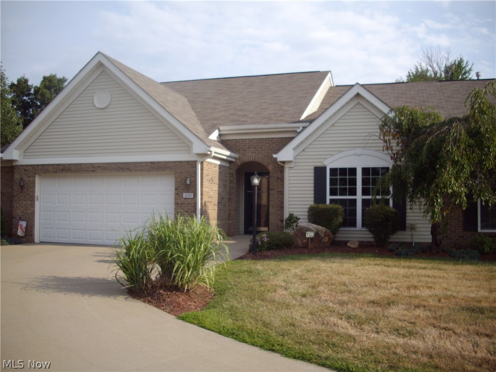 This lovely well kept Ranch Condo in Hyde Park Dev. area sits on a cul-de-sac end lot with plenty of extra parking at the home. It has 2 full baths, a wonderful open floor plan, Gas fireplace, sun lit rooms, vaulted ceiling in Master with walk in closet and walk in shower, the home is Handicap Accessible. The second bedroom has vaulted wood beam ceiling and double closets and a lovely Glass French bedroom entrance door and hardwood floor, the Entrance Foyer also offers hardwood flooring.
The kitchen area has Corian Counter Tops and lots of cabinets and a lovely Bayed Window and extra cabinets underneath, the dining room area offers Hardwood flooring and an access door to the rear patio for lovely evening meal or just enjoying. The Stainless Steel refrigerator, microwave, washer and dryer stay. This area is close to everything shopping and 20 minutes to Canton or Akron, and there is an extra parking pad at residence . NO LEASING OR RENTIN UNITS , ONLY OWNER OCCUPANTS OR FAMILY ALLOWED