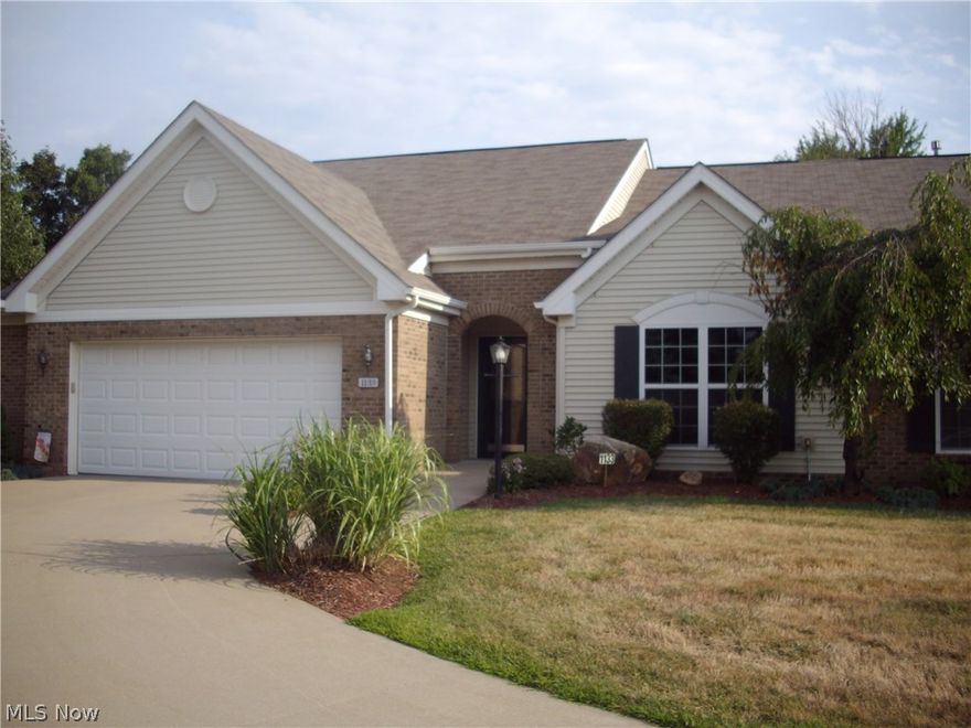 This lovely well kept Ranch Condo in Hyde Park Dev. area sits on a cul-de-sac end lot with plenty of extra parking at the home. It has 2 full baths, a wonderful open floor plan, Gas fireplace, sun lit rooms, vaulted ceiling in Master with walk in closet and walk in shower, the home is Handicap Accessible. The second bedroom has vaulted wood beam ceiling and double closets and a lovely Glass French bedroom entrance door and hardwood floor, the Entrance Foyer also offers hardwood flooring.
The kitchen area has Corian Counter Tops and lots of cabinets and a lovely Bayed Window and extra cabinets underneath, the dining room area offers Hardwood flooring and an access door to the rear patio for lovely evening meal or just enjoying. The Stainless Steel refrigerator, microwave, washer and dryer stay. This area is close to everything shopping and 20 minutes to Canton or Akron, and there is an extra parking pad at residence . NO LEASING OR RENTIN UNITS , ONLY OWNER OCCUPANTS OR FAMILY ALLOWED