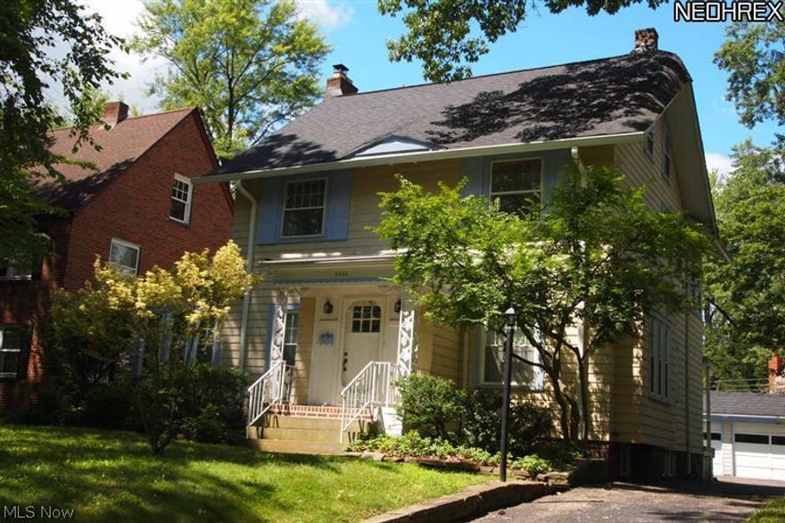 Welcome to old world charm from an era where quality was priority. This charming colonial is nestled on a freshly landscaped lot on a sought after street. Opens to foyer with original tile and beautiful hardwood floors throughout.  Huge 23' living room with cozy fireplace leads to sunroom for relaxing while looking at the mature landscaped lot.  Entertain in the formal dining room that leads to kitchen with built-ins and granite counter. 3 spacious bedrooms up with ample built-ins.  Basement is waiting to be finished as a lower rec room.  Built-ins and fresh paint throughout.  Act now on  this well priced home situated on a high-valued street! Not a short sale!