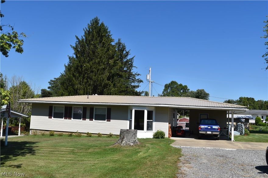 Lovely one story home with 3 bedroooms and 1.5 baths in a nice looking neighborhood. The master bedroom has a half bath. Home is in outstanding condition. The home has a newer metal roof, furnace, and some windows. Huge rear deck approximately 35x12. Per the owner his lot is 1/3rd of an acre. They are also including the blinds, drapes, and curtains.