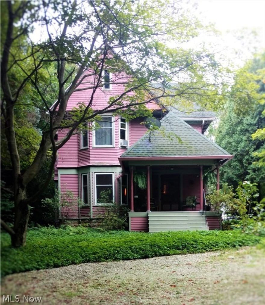 Beautiful century home in the Heart of Hiram Village. This 4 bedroom, 2 bath home has gorgeous built-ins and wood work throughout. A huge eat-in kitchen, formal dining room, and living room that would be great for entertaining. Solid hardwood flooring throughout home. Beautiful staircase in the entryway of home, as well as a stairway from kitchen area that leads to the upstairs. Sit and relax on the covered front porch or newly built back deck. This home is a must see! Schedule your showing today.