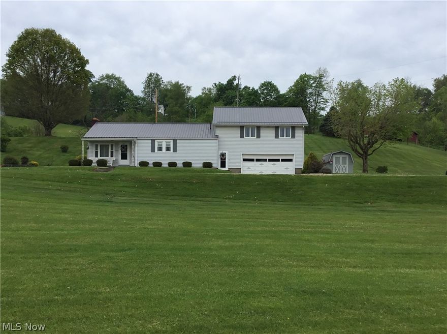 Absolute Auction!! Auction Date: June 30th, 6:00 PM   Located in the beautiful country just outside of Fresno and selling at absolute auction to the highest bidder. This 1,552 sq. ft split level home with a metal roof has 3 bedrooms and 2 full baths along with a full basement and 2-car attached garage. The main floor consists of a dine-in kitchen with tile backdrop, corian countertops and vinyl flooring, a living room with a wood-burning fireplace, in addition a family room with access to the back covered porch, and a full bathroom. Upstairs has 3 bedrooms and a full bathroom along with an attic storage area. The full basement has a kitchenette, storage room, fruit cellar room and has stairway access to the 2-car attached garage. The house is very clean and well maintained and has a B Dry waterproofing system in the basement. Utilities include electric, electric heat, private dug well & private septic. Included are all the appliances, washer and dryer, and a 8’x 10’storage barn. Do not