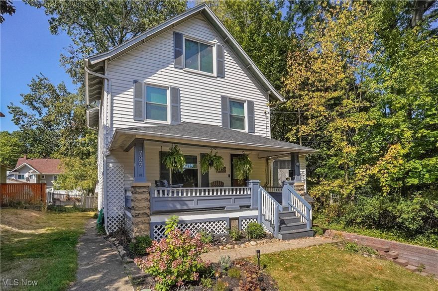 Welcome to this charming century home nestled on a picturesque brick street in the highly desirable Highland Square neighborhood. Character and charm are showcased throughout this home including curved archways, hardwood floors, wood doors with vintage glass knobs, classic crown molding, wide baseboards, and custom built-ins that reflect the craftsmanship of that era.
Enter into the spacious living room, where natural light is abundant with large windows and crown molding in the adjacent sunroom/office.   The formal dining room is perfect for entertaining, featuring stunning built-in cabinetry.  The updated kitchen offers granite counters, and a convenient powder room completes the first floor.  Upstairs, you’ll find three comfortable bedrooms and a full bath, while the third floor offers a private fourth bedroom featuring a walk-in closet. Updates include:  New Roof - August, 2025; Furnace and hot water tank - 2023; AC - 2018.   An attached one-car garage adds everyday practicality to this unique and character-rich home. Close to the Cuyahoga Valley National Park, restaurants, and library  don’t miss your chance to own a piece of Highland Square’s history on one of its most charming streets!