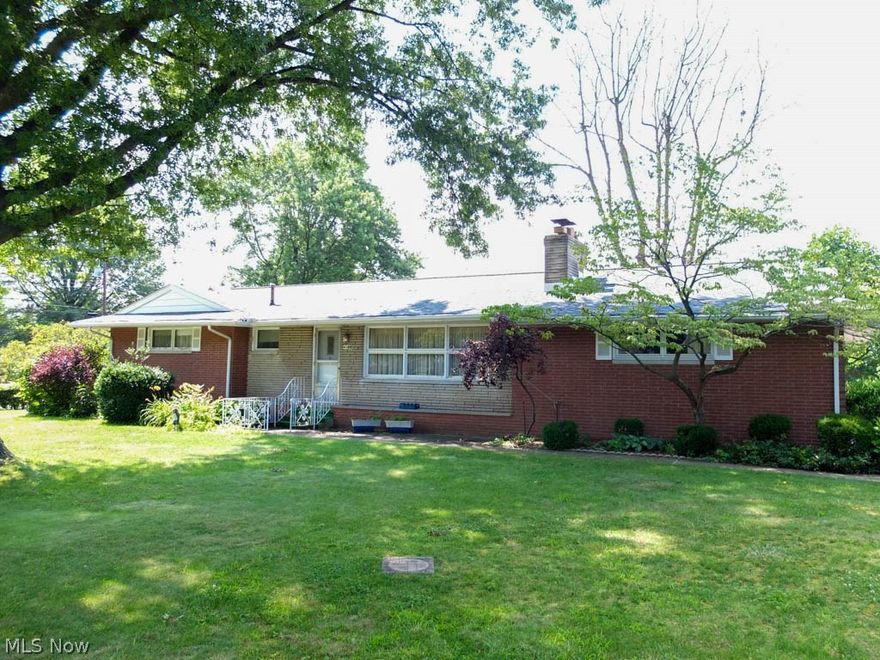 Much bigger than it looks! Well maintained 3 bedroom, 3 full bath brick ranch with over 1,600 sq ft PLUS a finished lower level! Convenient location on a quiet street minutes away from Belden Village. First floor laundry room with cabinets - a real bonus! Sun-filled living room with a fireplace is open to the dining room. Kitchen has a large dinette and comes fully applianced with a dishwasher, refrigerator, oven, range and over the range microwave. Bonus sunroom overlooking the yard offers an awesome space for entertaining. Great closet space and hardwood flooring under the carpet in all 3 bedrooms. The master suite has a private full bath. Large main full bath with nice counter space. Wonderful additional living areas on the finished lower level! The family/media room has a fireplace and large wet bar perfect for entertaining. Walk-in cedar closet off of the rec room. Bonus play room/office with a full bath. 2-car side load glazed tile garage, too. Fantastic home in need of some cosm