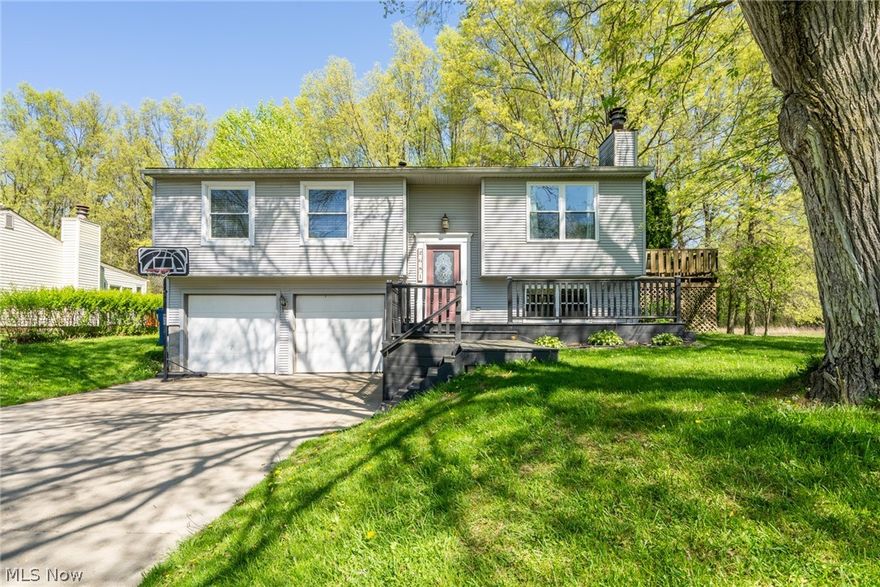 This is the one you've been waiting for in Lordstown! Welcome home to your spacious 3/4 bedroom bi-level located on almost an acre in a peaceful neighborhood setting.  Brand new Anderson windows were installed in December of 2022, with a transferrable warranty.  This home features a large front deck, and a private deck off the dining area that's perfect for your morning coffee! Head downstairs to a nicely finished space which could be another bedroom, or an entertainment area. The sky is the limit to what you can do with this home! The two-car attached garage has lots of space for storage.  Just move in and make it your own. This home won't last on the market, schedule your showing today!