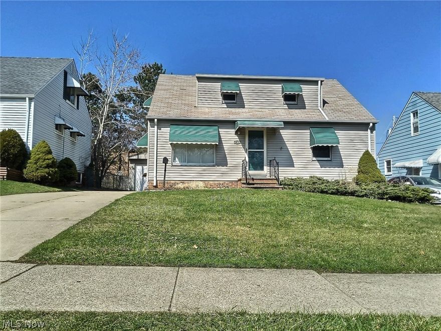 Three bedroom, two full bath home in Garfield Heights! This Cape Cod features two bedrooms on the main floor, with the spacious master bedroom occupying the entire second story. The basement is equipped with a full bathroom, built-in bar, and plenty of space for an in-house getaway or storage! Sliding glass door in the kitchen leads out to the deck looking out at a fenced backyard. The detached two-car garage offers plenty of space to park your vehicles or store extra items. Easy to show, schedule your viewing today!