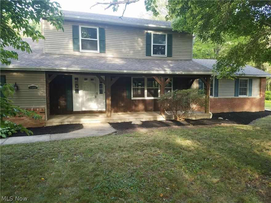 Remodeled and ready for new owners.  This large 4 bedroom home sits back off the road on a 2 acre lot.  It features a large first floor master bedroom w/ a huge master bath and walk-in closet.  Upstairs there are 3 more bedrooms including another master bedroom with it's own full bathroom and deck.  With a living room, 2 family rooms, and a sun room, this home offers plenty of space for everyone.