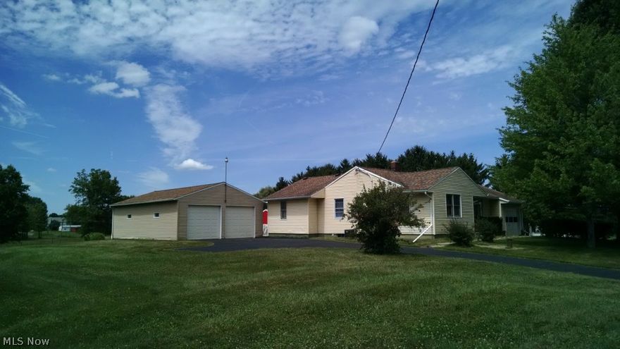 Must See!! This 4 bedroom 1 bath Ranch home with 1 car attached garage on over an acre!! Large finished 36x23 detached 4 car garage. Newer roof, septic and well!! Central air and nice back patio area. One additional outbuilding for extra storage. Call today to see this home it won't last!!