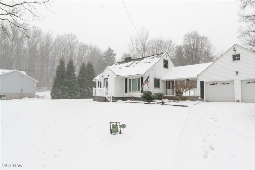 Nestled on nearly ¾ of an acre across two parcels, this delightful 3-bedroom, 2-bath Cape Cod blends classic character with modern comfort. Step inside to discover refinished original hardwood floors, Anderson windows and doors, and oversized windows that bathe the home in natural light. A welcoming breezeway connects the home to a two-car garage, complete with an additional carport for extra parking. Above the garage, a spacious loft offers endless possibilities — ideal for a home office, art studio, or bonus room. The walk-out basement, featuring a cozy fireplace, provides excellent potential to be finished into a family room or additional living space Enjoy the perfect blend of peaceful country living with the convenience of being just minutes from Portage Lakes, Green, Barberton, and Canal Fulton. New hot water tank, roof and siding replaced 10 years ago. Newer septic system and well has been maintained regularly.

Don’t miss this wonderful opportunity to make this charming New Franklin property your new home!