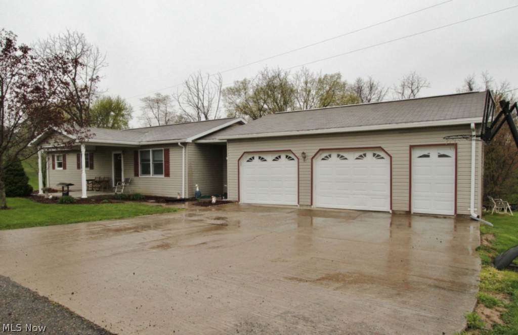 Ranch on 3.03 acres large two and a half garage mud room, large eat in kitchen.