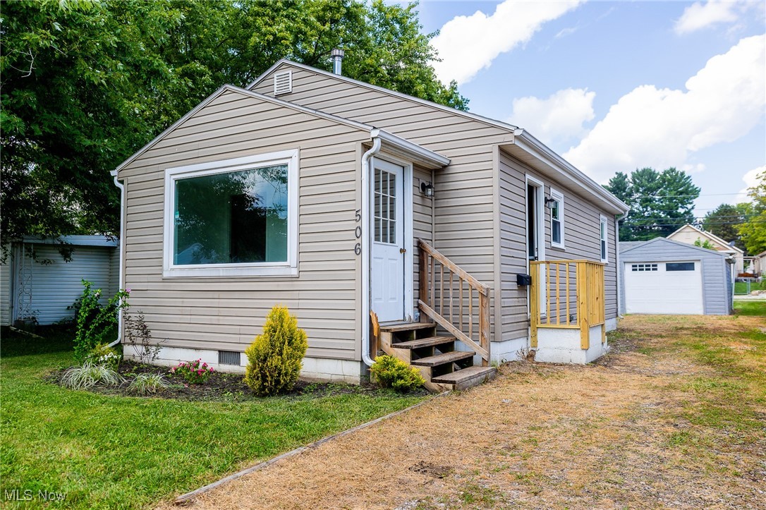 Welcome to this beautifully remodeled 2-bedroom, 1-bath home in a great neighborhood! Inside, you’ll find a fresh kitchen with new cabinets, updated paint, trim, and flooring, plus new windows, light fixtures, a hot water heater, and an exterior door. Convenient main-floor laundry makes everyday living easy. A new mini-split system provides efficient heating and cooling, and all appliances stay. Outside, enjoy the backyard—perfect for summer barbecues—and a detached garage with plenty of storage. The lawnmower is also included with the property. Move-in ready and waiting for its next owner!