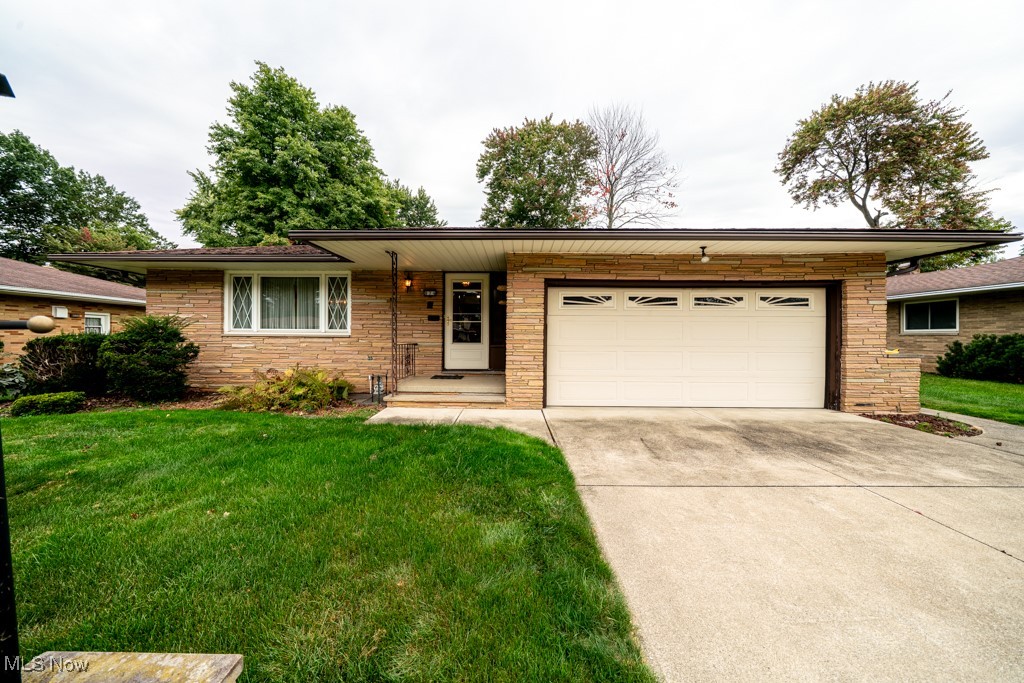 Welcome to this classic 3-bedroom, 2-bath Mid-Century Ranch in Seven Hills! Set on a .28-acre lot in a desirable neighborhood, this home offers spacious living with a full basement and attached 2-car garage. Enjoy the timeless curb appeal, functional layout, and convenient location near shopping, dining, and schools. A wonderful opportunity in a sought-after community!