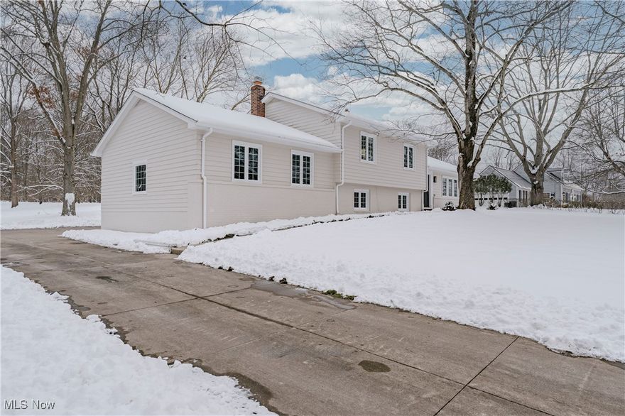 Welcome to 3076 Lander Rd – A Fully Renovated Gem in the Heart of Pepper Pike! Set on 1.55 acres, this stunning 4-bedroom, 3-bath home offers over 3,500 square feet of beautifully updated living space designed with today’s family in mind. Completely renovated from top to bottom, it features fresh paint, new flooring, updated windows, and modern finishes that create a bright, open, and inviting atmosphere. The heart of the home is the gorgeous chef’s kitchen, equipped with brand-new appliances, sleek cabinetry, and an oversized island that makes both quick breakfasts and family gatherings effortless. The adjoining dining area, framed by a large bay window, fills with natural light and offers the perfect backdrop for creating special memories. The spacious family room is anchored by a charming fireplace, making it an ideal place to unwind, while a screened porch extends your living space outdoors and opens directly to the expansive backyard. This level also includes a generous bedroom and full bath, perfect for guests or multi-generational living. Upstairs, you’ll find three additional bedrooms, including a primary suite with its own private bathroom, along with another full bath to serve the remaining rooms. A versatile recreation room provides even more space for family fun, fitness, or a media lounge, and the convenient laundry area completes this level. An attached rear-load two-car garage, complete with a large parking pad and turnaround, adds ease and practicality to the home’s thoughtful design. Perfectly located in the desirable Pepper Pike community, this home places you close to top-rated schools, libraries, restaurants, and health clubs. Offering a seamless blend of comfort, style, and convenience, 3076 Lander Rd is move-in ready and waiting for its next chapter.