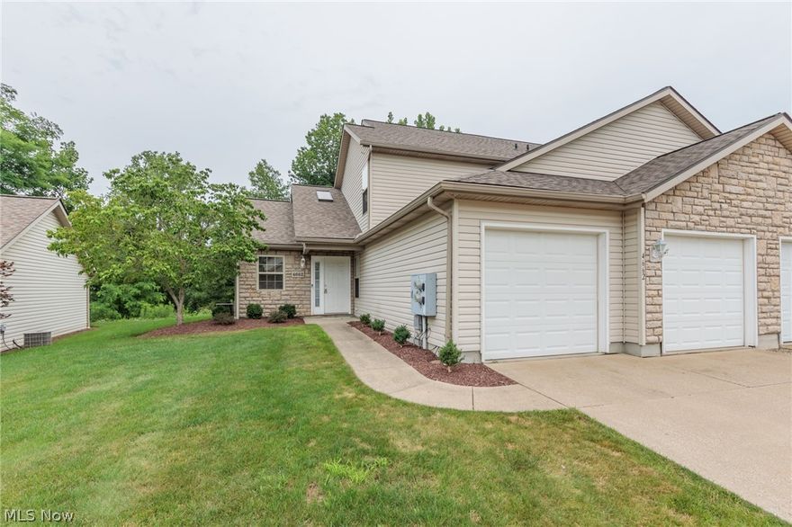 A remarkable 3 bedroom, 2 full bath townhome, this condo sits on a very private lot that overlooks a ravine/creek that is fully treed.  There is a large great room, open kitchen, first floor laundry, and a first floor bedroom and bathroom.  The upstairs consists of 2 large bedrooms, one with a walk-in closet, and a jack-&-jill bath.  There is an attached 2 car garage, guest parking, and all kind of green space in Pleasant Lakes.