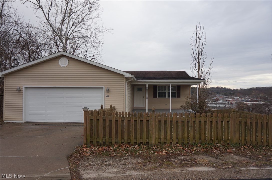 First floor living. House is top of hill over looking South Parkersburg. Newer furnace, air conditioning and hot water heater. Newer flooring to include ceramic flooring throughout except for the carpeted bedrooms. Updated kitchen (cabinets are painted) with new stainless appliances. Gray, glass back splash. Sliding door with built in blinds leads to a composite deck. White 6 panel doors, and 6" baseboard. Freshly painted in two shades of gray. All newer lighting. Newer garage door with keyless entry. Inside dimensions on garage 23x23. This house is OLRA.