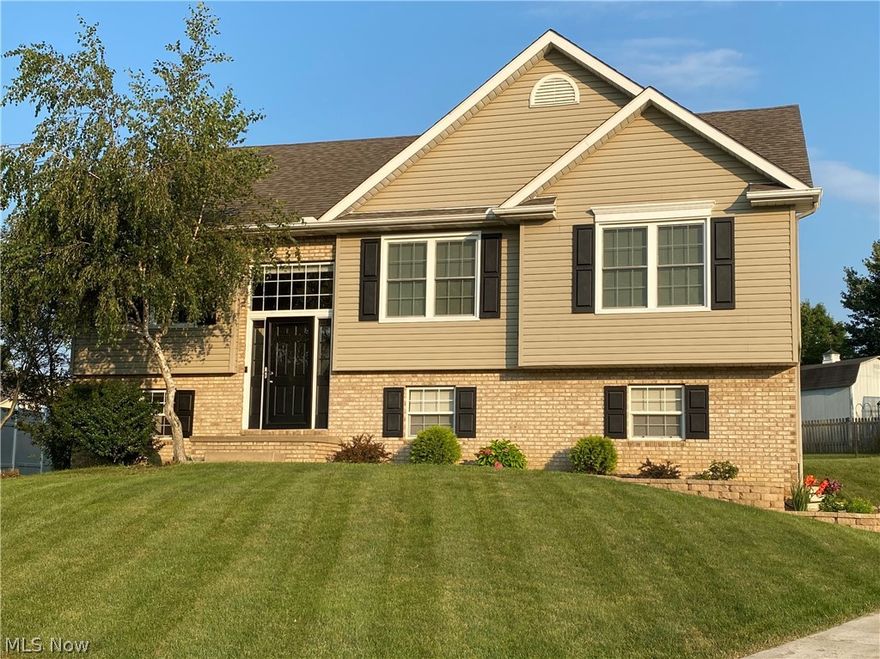 Beautiful well-maintained home nestled on a quiet cul-de-sac in Canal Fulton! Attractive open floor plan makes this any entertainer's dream. Spacious feel with cathedral ceilings in the living area. Barstool counter setup adjoins the living room with the kitchen complete with stainless appliances. All bedrooms and updated full guest bath on the main level. Spacious master suite complete with walk in closet and updated bath. Lower level features a half bath and finished room with endless possibilities. Oversized garage accommodates extra storage needs. Living room opens to a wonderful deck overlooking a fully fenced backyard complete with storage shed. Call today for your private showing!