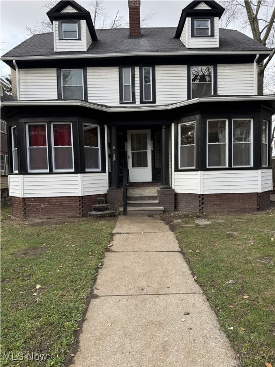 Welcome to this spacious Cleveland Heights side-by-side duplex offering over 3,700 square feet of living space and a total of eight bedrooms. This property strikes the perfect balance between classic character and modern comfort, making it an excellent choice whether you want to live on one side and let the other help pay your mortgage, or rent out both units for a projected gross monthly income of more than $3,600. The drive side has been beautifully updated with today’s most desirable finishes, including granite countertops, white shaker cabinets, stainless steel appliances, new LVP flooring, updated lighting, fresh paint throughout, and stunning refinished hardwood floors. A cozy decorative fireplace sets a warm tone in the living area, while the sun-filled front sitting nook offers the perfect spot for morning coffee, reading, or relaxation. The full bath has been tastefully updated with a stylish tile surround. Both units feature four spacious bedrooms, one and a half baths, and a large walk-in attic on the third floor—ideal for easy storage or future flexibility. The rented side is currently bringing in $1,375 per month and includes newer lighting, windows, kitchen updates, and bathroom improvements. Major upgrades provide long-term peace of mind, including a new roof, a newly built two-car garage, new gutters and downspouts, and a new meter and mast on the drive side. The home will be delivered POS compliant, ensuring a smooth transition with no immediate repairs required. Located in a desirable Cleveland Heights neighborhood, this duplex offers charm, comfort, strong income potential, and move-in-ready convenience—an exceptional opportunity for an owner-occupant or an investor seeking long-term value.  Conveniently located near the Lee Road Entertainment District, Cain Park, and a variety of shopping options.