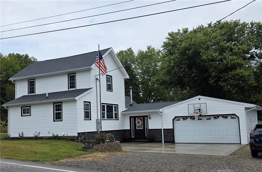 Wow! Watch the sunset over open fields while dining, and start your day with a sunrise view from the deck with your morning coffee. This beautifully renovated home on 1.5 acres has it all! The property is thoughtfully divided into sections for leisure, an orchard, gardening, and even livestock.
The galley kitchen features custom Amish-made cabinets and opens directly to the deck for breathtaking morning views. The dining room’s large picture window frames glorious sunsets, while the spacious living room with a wood-burning stove invites cozy evenings.
Inside, you’ll find three large bedrooms, wood flooring in the dining room and master, and LVT flooring throughout the remaining rooms. Upstairs bedrooms include built-in closet shelving, while the master connects to a bathroom equipped with a relaxing spa-style shower/tub ensemble.
Updates abound: HVAC, plumbing, water softener with reverse osmosis, electrical (including service to the home), roof, siding, windows, most doors, and landscaping have all been replaced or refreshed. The concrete driveway includes a basketball hoop for extra fun.
For your vehicles and projects, there’s both an attached 2-car garage and a detached single-car garage in the back.
All of this comes in a convenient location—just minutes from Bolivar and Beach City, and only 15 minutes from Canton. Don’t miss this one—schedule your showing today!