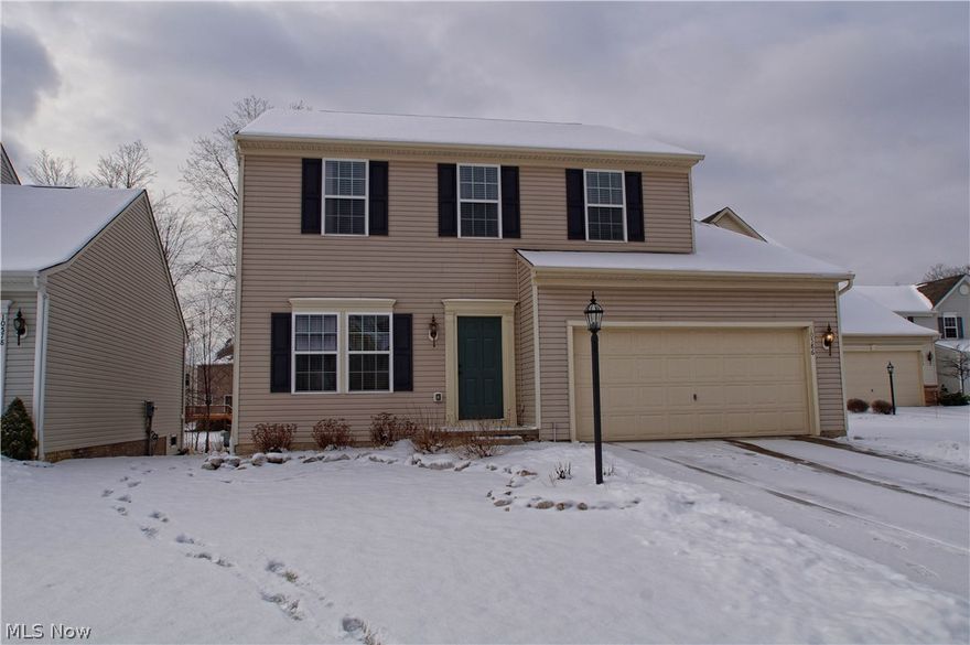 Welcome to this well maintained, spacious home on a great homesite backing up to natural preserve in desirable Willowbrook community featuring Twinsburg Schools. This home includes an open floor concept, 3 bedrooms, a large loft area that can easily be converted into 4th bedroom if needed, 2.5 baths, extra living area that can also be used as formal dining room, 2 car attached garage, first floor laundry room, and a professionally finished basement with a bathroom rough-in. Spacious kitchen includes a gourmet island, walk-in pantry, lots of counter space/cabinets and is open to sunny morning room that leads you to a large deck.  Seller spent thousands of dollars by installing landscaping, adding a deck, painting and completing many other home improvements.   Willowbrook community features 2 ponds, playground, walking trails and is conveniently located near shopping, restaurant, Liberty Park and much more. Seller is providing a 1 year home warranty by America's Preferred. It is a must s