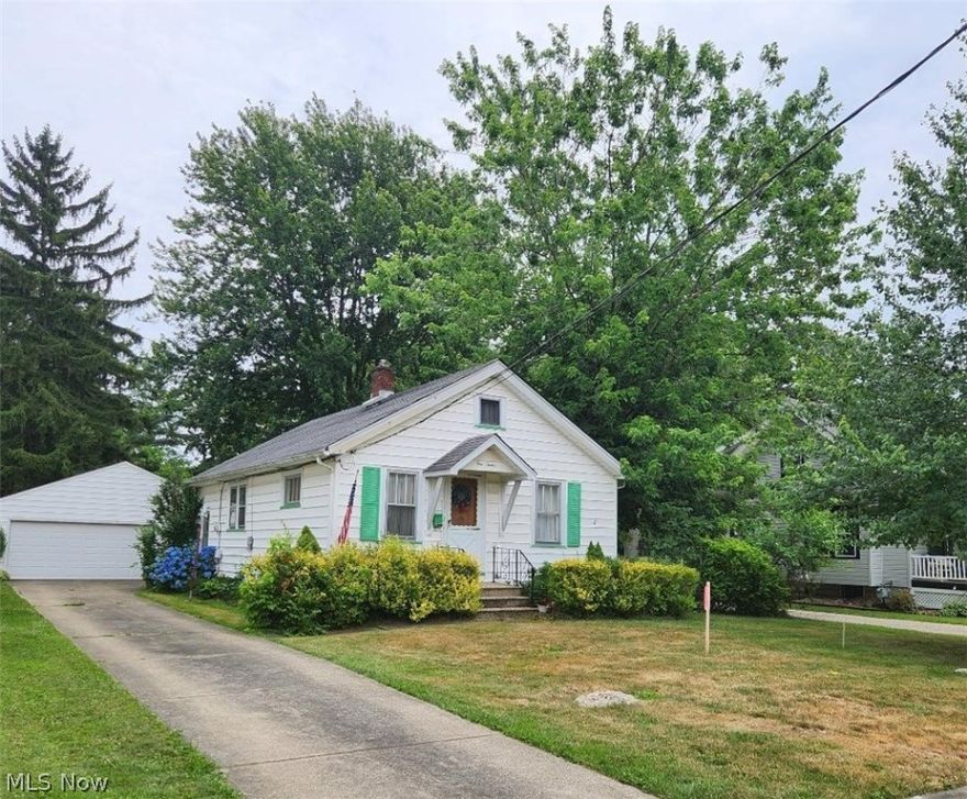 Charming cottage-style ranch home on a parklike lot nestled on a quiet street in the heart of Berea. This quaint home features 2 full baths, an eat-in kitchen and a large screened-in porch (off of detached 2-car garage). The roof on the house is approx. 5 yrs old and the garage roof was completed in June of 2024. This lovely residence is within walking distance to Baldwin Wallace University campus, downtown Berea shops, businesses & dining, as well as recreational & entertainment venues at Coe Lake, the MetroParks & Cuyahoga County Fairgrounds. Call lister to schedule your showing today.