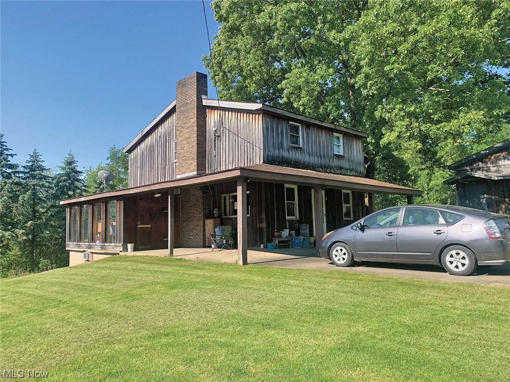 50-Acre Farm – Sells As One Tract - Secluded Hilltop Setting – 2/3 Wooded Balance Tillable – Good Hunting - Developed Spring – Three Bedrooms – Two-Story Home With Wraparound Porch – 54 X 60 Pole Building With 24 X 60 Addition – 30 X 40 Workshop With 16 X 16 Hunters Room – Chicken Coup – Fox Twp. – Carroll Co. – No Zoning – Dead-End Road – You’ll Like This One! Online Bidding Available On Real Estate. Family owned approx. 50 years. ABSOLUTE AUCTION, all sells to the highest bidder on location. ONLINE AND LIVE ON-SITE BIDDING WILL BEGIN MONDAY – JUNE 26, 2023 – 5:30 PM, REAL ESTATE SELLS 6:00 PM.
Home has kitchen and dining area, remodeled full bath on main level, living room with brick fireplace, open staircase, three bedrooms up, full 12-course block basement with the lock-up room, wraparound covered concrete porch, enclosed sun porch, drilled well, septic, shingle roof, 200-amp breakers, 2 gardens, nice trees, and great view. Photos and drone video on our website. The property will