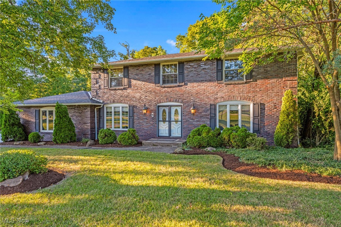 Set on nearly an acre (.91) of beautifully maintained property, this all-brick 5-bedroom Colonial combines timeless character with modern convenience. With four garage spaces—two attached and a custom detached 24’ x 28’ heated garage built in 2019 previously used as working studio featuring heat, A/C, 10’ ceilings, TV, Sonos sound, and dual overhead doors—side door opens for rear projection outdoor movie.
Inside, you’ll find hardwood floors throughout both levels, an updated chef’s kitchen with wood cabinetry, granite counters, stainless steel appliances, Brazilian nature stone backsplash, breakfast bar, and a gas range with pot filler. The spacious dining room is filled with natural light, gas fireplace and direct access to the patio. A bright home office with french doors and motorized quiet-close shade offers the perfect work-from-home retreat. The first floor also includes a half bath, laundry, and pantry.
Upstairs, the primary suite features a private bath and walk-in closet, joined by four generously sized bedrooms and a second full bath. Both bathrooms have been tastefully renovated.
Basement has movie theater with built in surround sound, theater seats, gym, recreation room with bar, fireplace. Landscape outdoor speakers by front door, back patio and by firepit.
Home is equipped with Crestron system, LUMA security cameras, Sonos sound system on first floor, master bedroom/bathroom, home theater and garages.