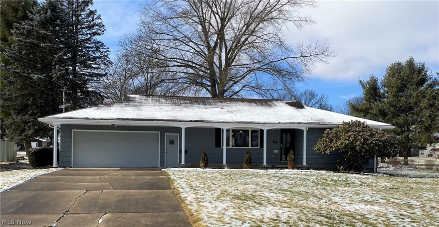 Columbiana, OH -LOCATION,LOCATION, LOCATION! Looking for a turn key ranch style home on a cul-de-sac, you've found it! The first floor of this lovely home offers a living room with a large picture window, dining area, kitchen with breakfast bar, laundry room, 2 bedrooms and TWO water closets. The basement is where you will find the 3rd water closet and the open shower. There is walk up storage space above the over sized 2 car garage. Closet space and storage space will not be a issue in this well maintained home! This spacious home boasts new LTV flooring, new carpeting in the bedrooms, new interior paint, new lighting, new water heater as well as many updates including: electric, furnace and air conditioning. During the warmer months you can relax on the front porch, the rear deck or on the enclosed rear porch. This home is within walking distance to Harvey S. Firestone Park which offers a swimming pool, basketball, tennis and pickleball courts, baseball field, football field, walking