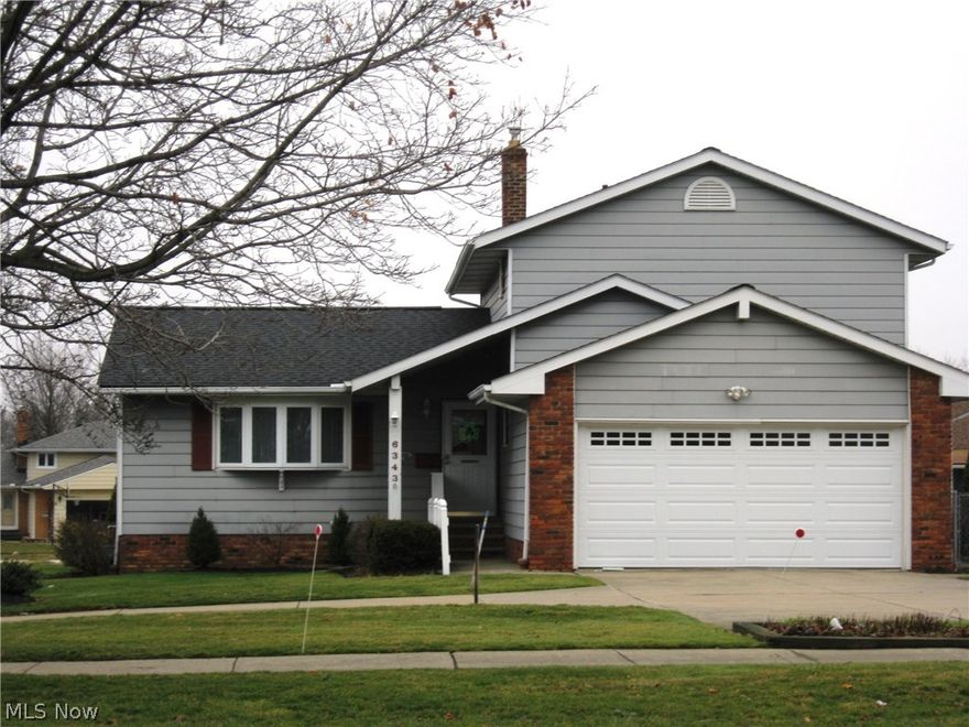 Pride of ownership inside & out.  One owner home extremely well maintained.  4 Level Split Level.Great room features bay window, chair rail and vaulted ceiling. Open to dining room that has beautiful window and built in shelf.  Eat in kitchen has garden window! So much natural daylight to offer. One step down to the cozy family room with sliders to a fabulous 3 season room with skylights.  Notice the walls of windows looking out to a low maintenance, fully fenced extremely private back yard with tons of room for outdoor entertainment.  Bedroom on this level is currently used as an office. The large mud room accessed from the garage is a true bonus with counters and cabinets! All 3 second level bedrooms have generous sized closets. Lower level has very large laundry room and finished rec room for more entertainment space. Home is freshly painted in today’s neutral tones. Roof 2012, furnace & A/C 2013, hot water tank 2015. Additional parking pad! Effective year built on this property is