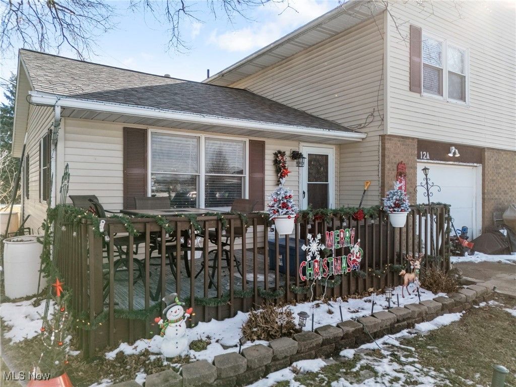 Photo of 1250 1252 Main Street, Lakemore, OH 44312 (MLS # 5177718)